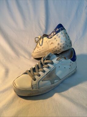 Golden Goose White Sneakers with Silver Star Accent and Blue Heel